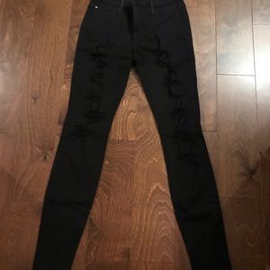 Joe’s destroyed black denim jeans.